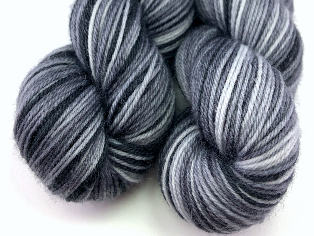 Greyscale self-striping sock yarn