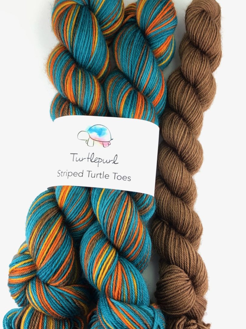 It takes a village self-striping sock yarn