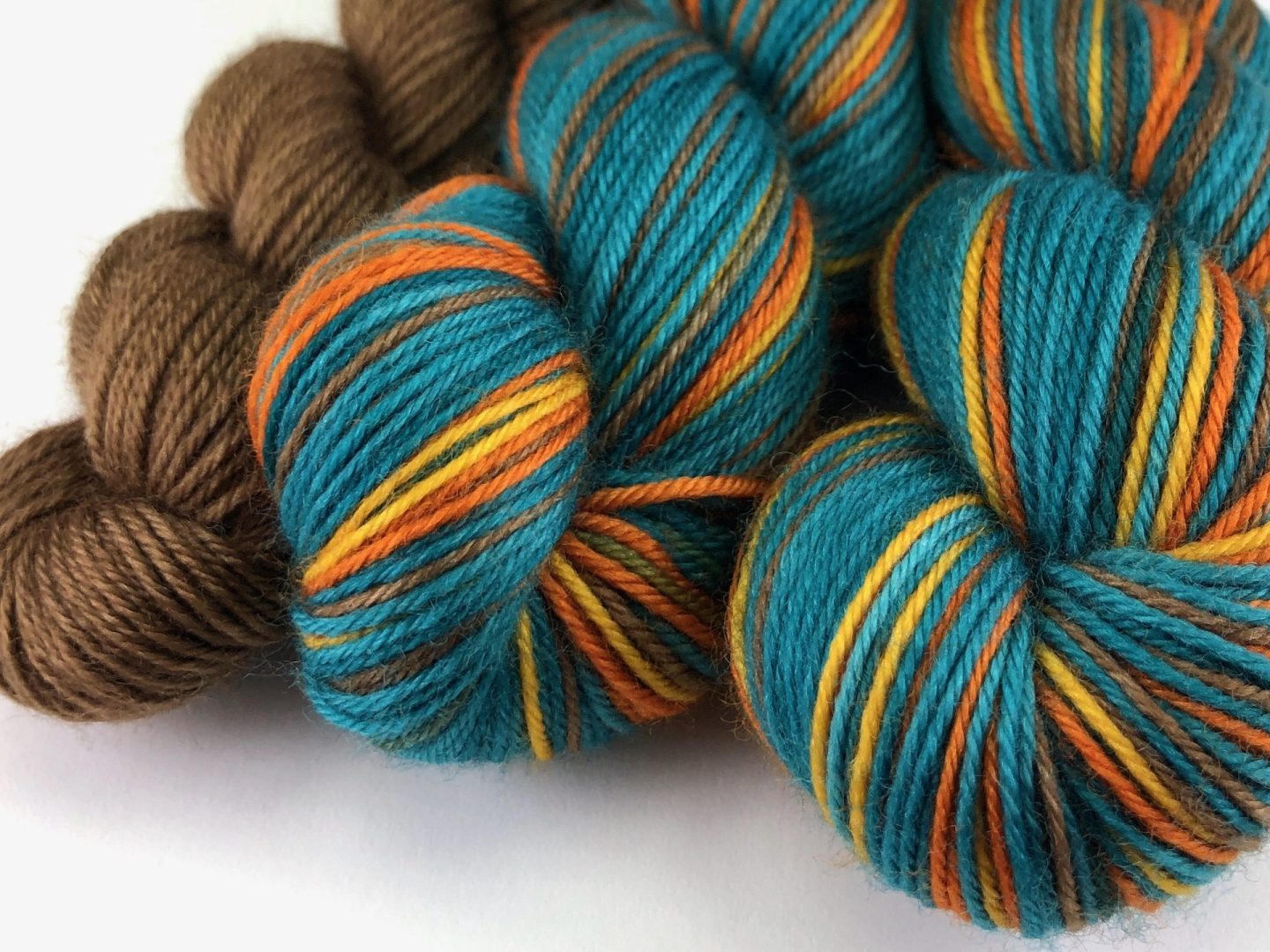 It takes a village self-striping sock yarn