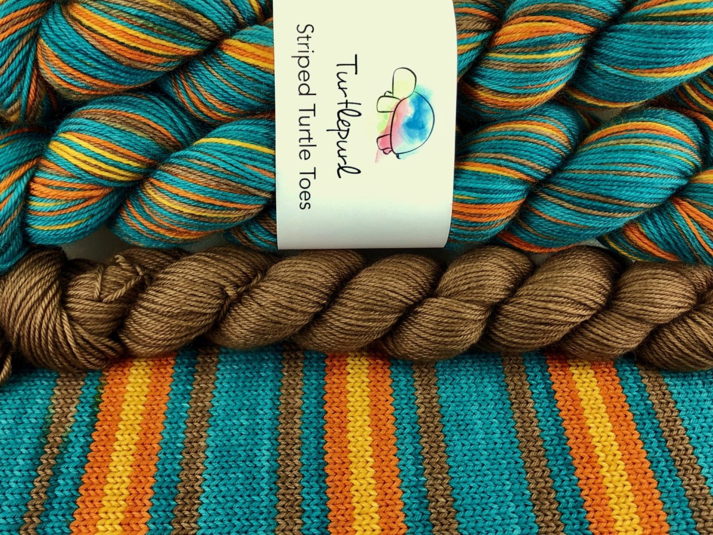 It takes a village self-striping sock yarn