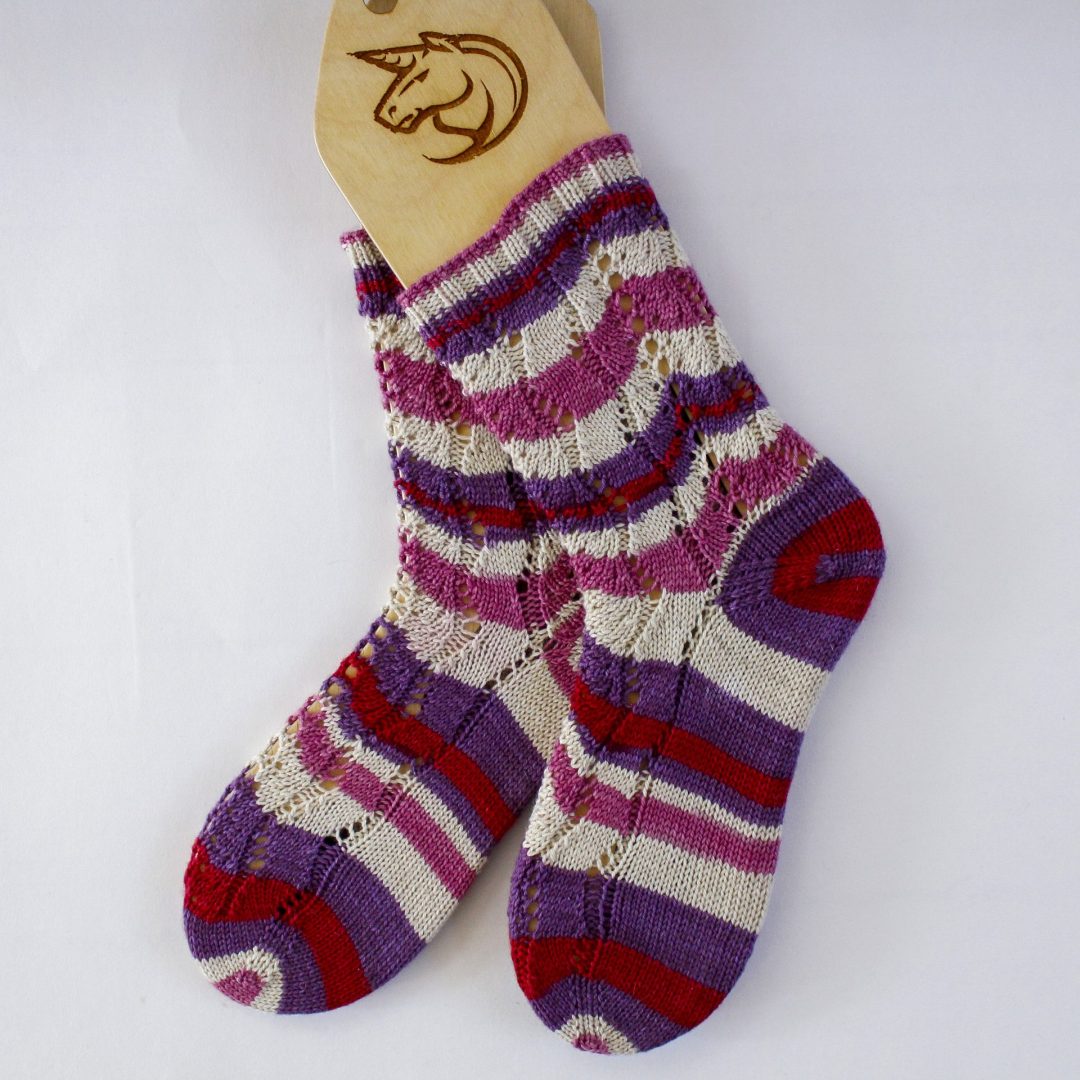 Self-striping yarn finished socks