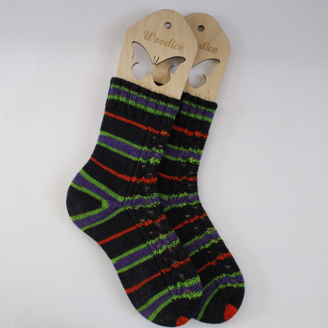 Self-striping yarn finished socks