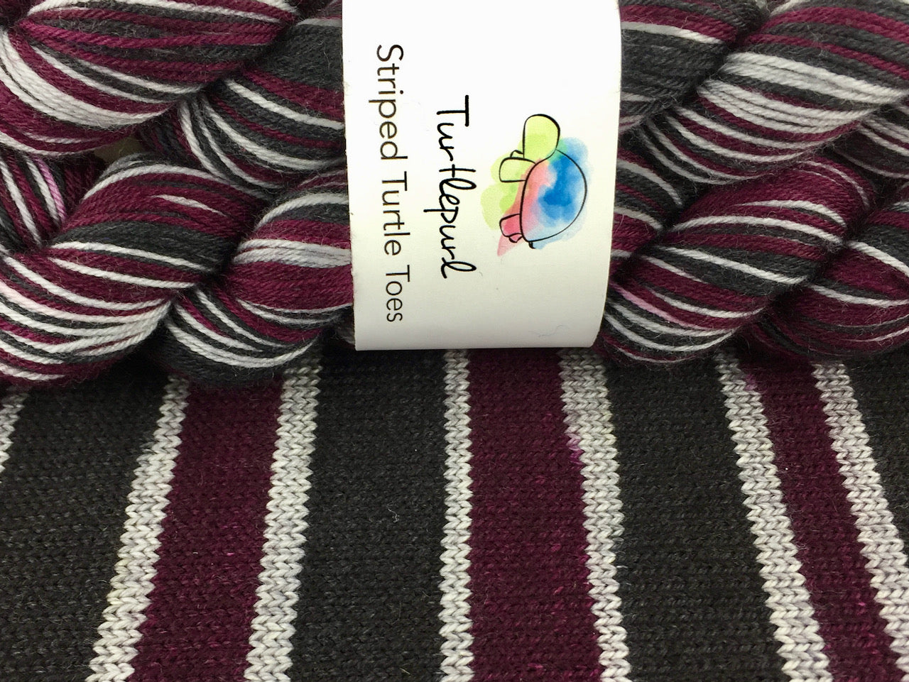 Gothic plum self-striping sock yarn