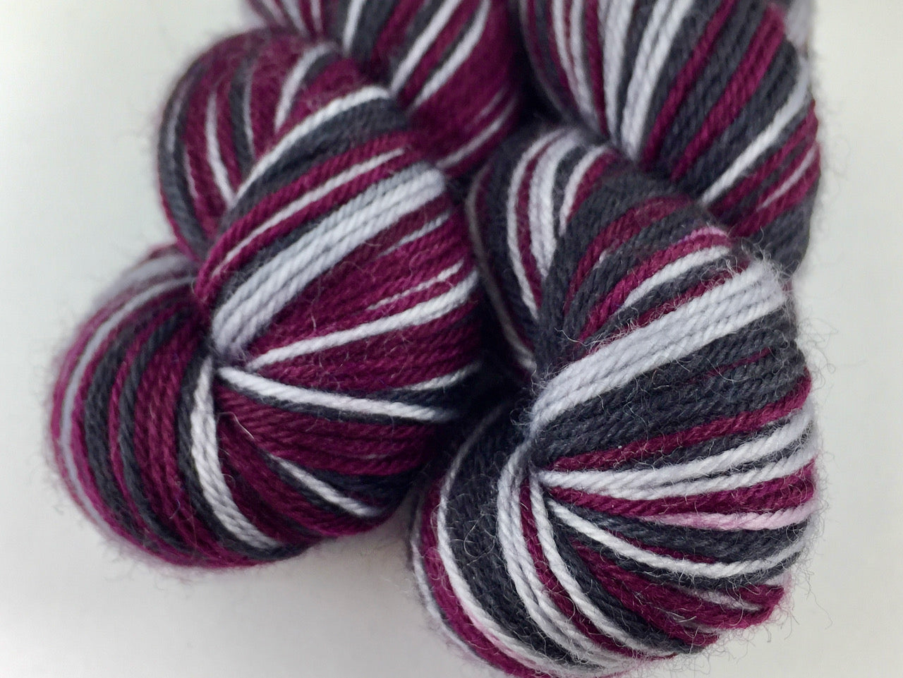 Gothic plum self-striping sock yarn