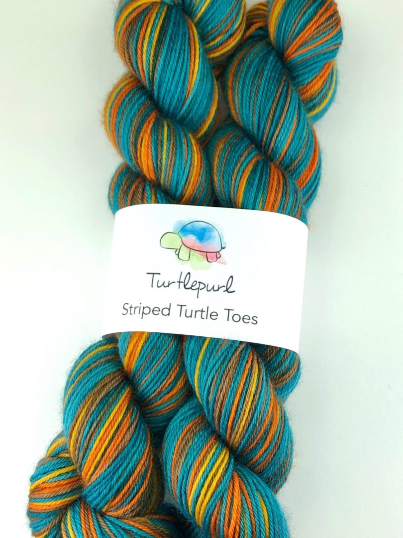 It takes a village self-striping sock yarn