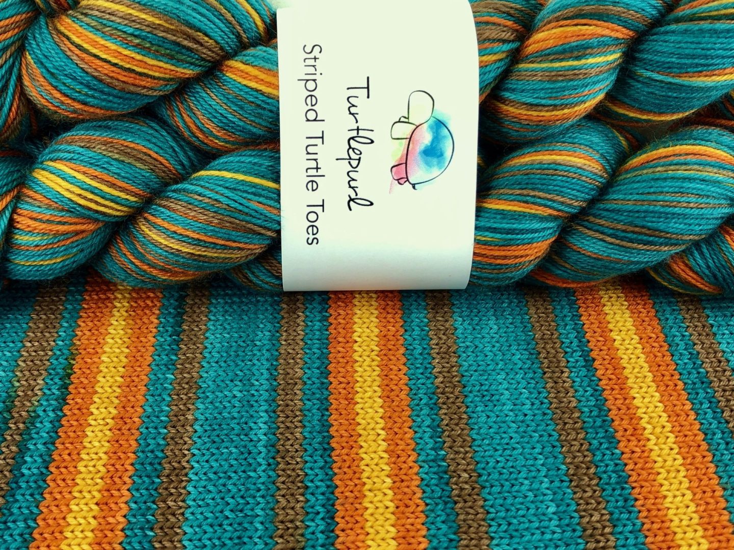 It takes a village self-striping sock yarn