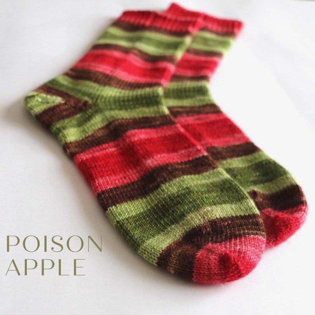 Poison apple self-striping sock yarn