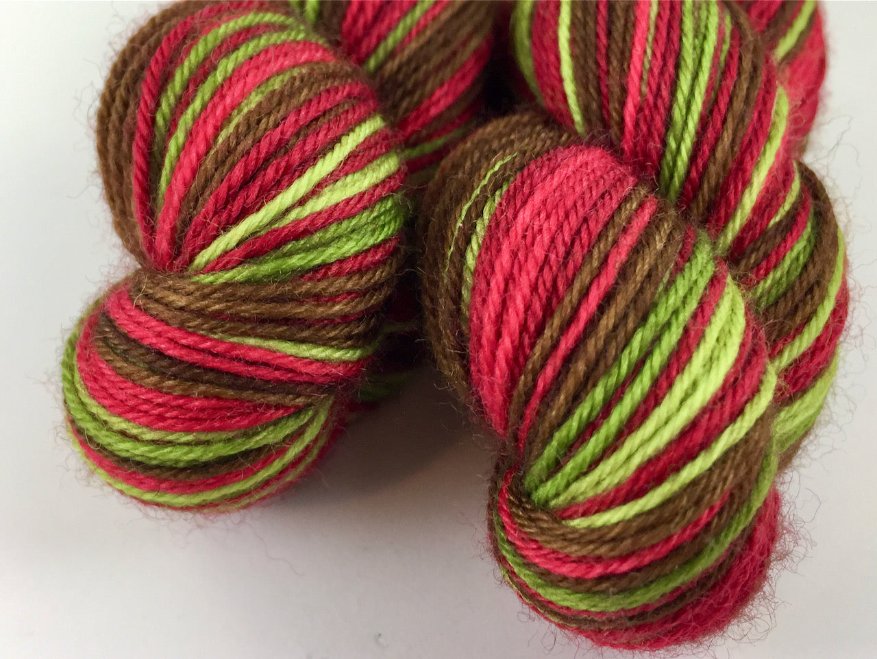 Poison apple self-striping sock yarn