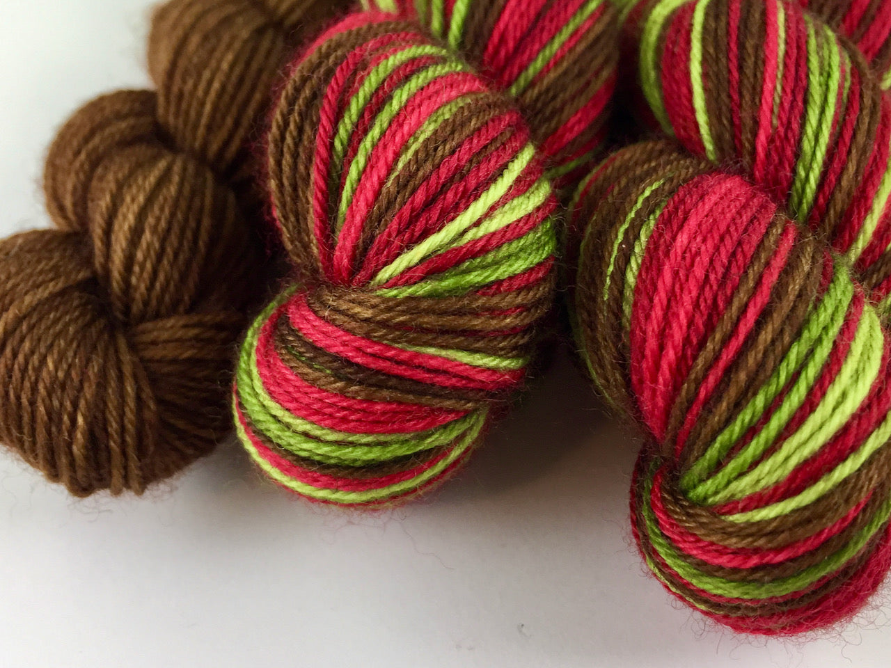 Poison apple self-striping sock yarn